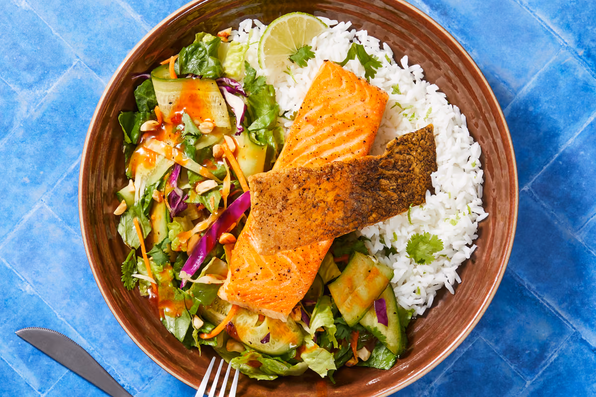 Crispy Salmon Rice Bowls: Sweet Chili Cucumber Slaw, Toasted Peanuts & Lime