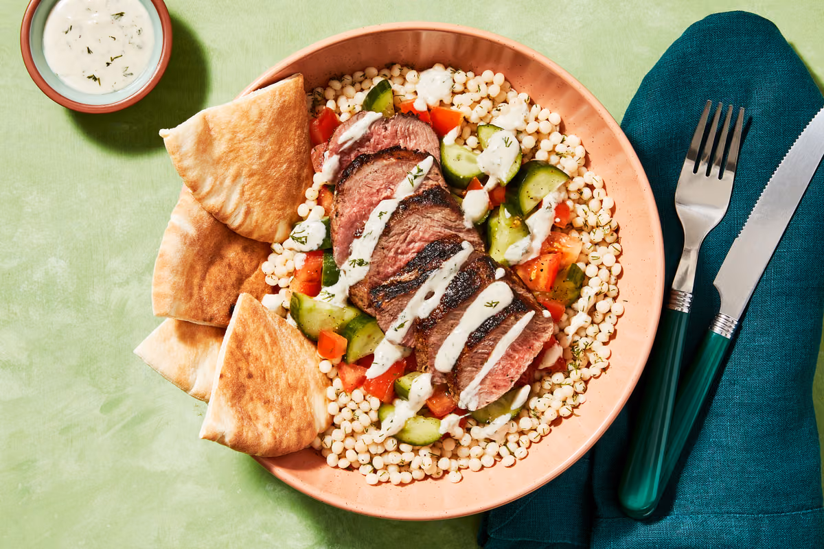 Garlicky Steak Bowls with Tomato-Cuke Salad