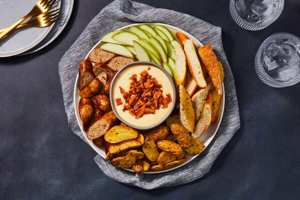 Porktacular Bacon Fondue Brunch Platter: Maple Sausage, Roasted Potatoes & Garlic Toasts