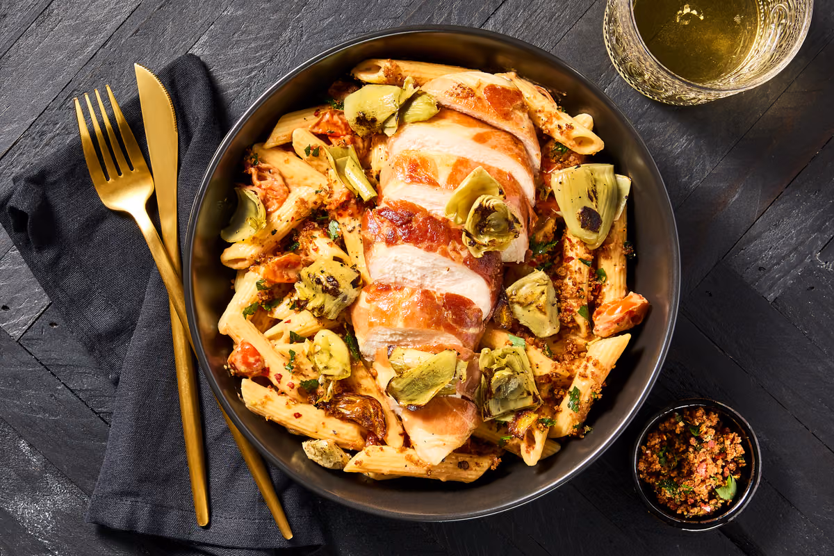 Prosciutto Chicken & Roasted Artichokes: Creamy Burst-Tomato Penne & Spicy Breadcrumbs