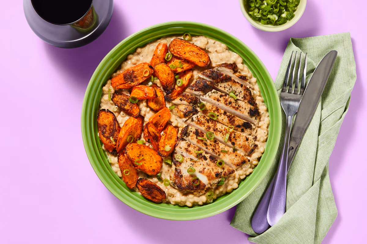 Pork Chops over Creamy Parmesan Couscous